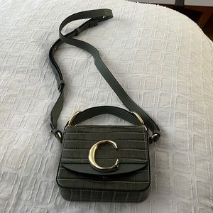 Olive green Bag with gold details. Never worn before.
